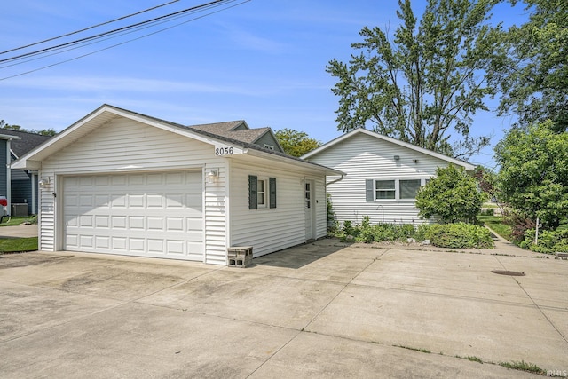 8056 E N Rd, Syracuse, IN 46567 - view of home's exterior with a detached garage