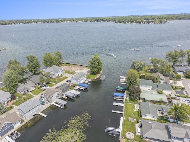 8056 E N Rd, Syracuse, IN 46567 - aerial view of property's location with a nearby body of water and nearby suburban area