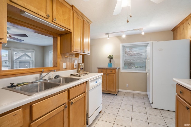 8056 E N Rd, Syracuse, IN 46567 - kitchen with a ceiling fan, white appliances, a sink, light countertops, and light tile patterned flooring