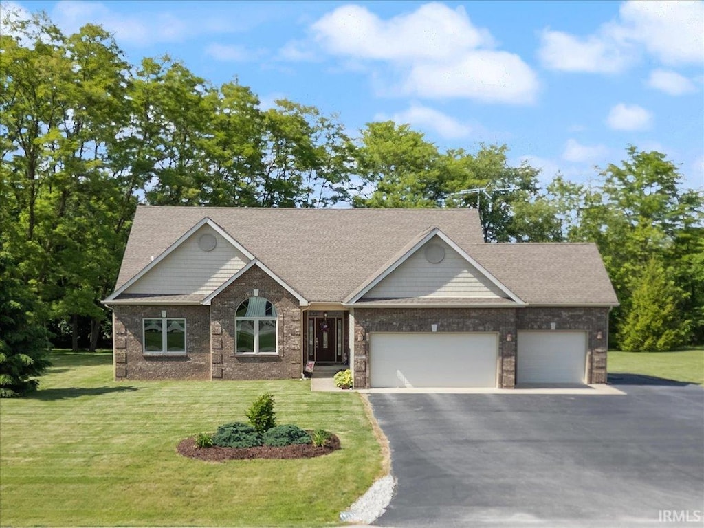 186 Eastatoe Ln, Lafayette, IN 47905 - single story home with a garage, a front lawn, asphalt driveway, and a shingled roof