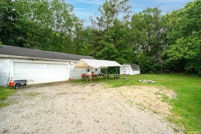 59479 Mayflower Rd, South Bend, IN 46619 - garage featuring a shed
