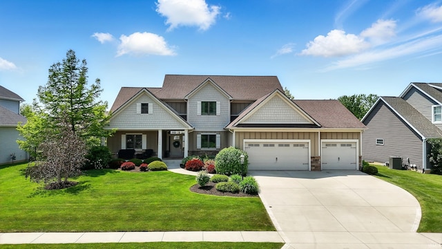 16265 Gemma Pass, Huntertown, IN 46748 - craftsman-style home with board and batten siding, an attached garage, driveway, and a front lawn