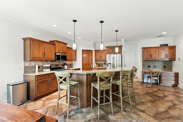 16265 Gemma Pass, Huntertown, IN 46748 - kitchen featuring stainless steel appliances, tasteful backsplash, brown cabinetry, a kitchen bar, and crown molding