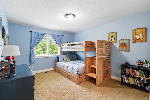 16265 Gemma Pass, Huntertown, IN 46748 - bedroom with carpet flooring, baseboards, and a textured ceiling