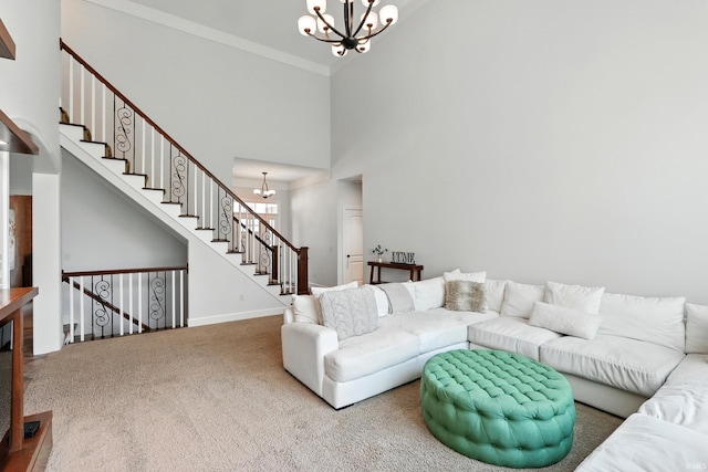 16265 Gemma Pass, Huntertown, IN 46748 - living area featuring a chandelier, carpet flooring, a towering ceiling, baseboards, and crown molding