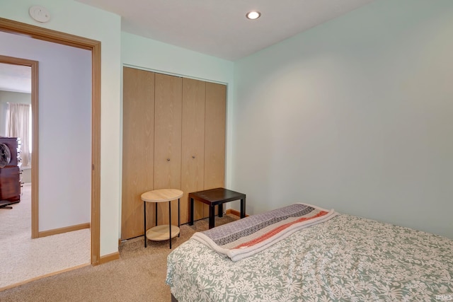 3502 S Tyler Ln, Bloomington, IN 47403 - bedroom with light carpet, a closet, baseboards, and recessed lighting
