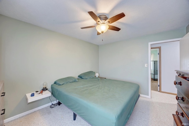 3502 S Tyler Ln, Bloomington, IN 47403 - bedroom featuring light colored carpet, baseboards, and ceiling fan