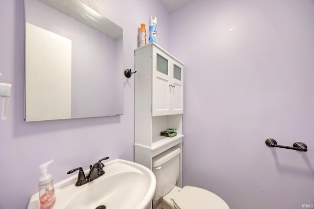 3502 S Tyler Ln, Bloomington, IN 47403 - half bathroom with toilet and a sink