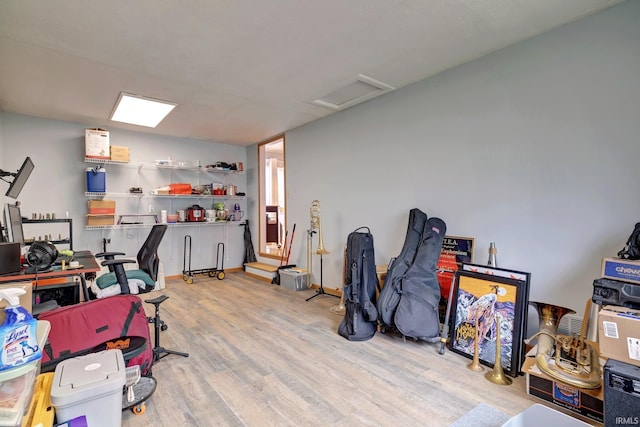 3502 S Tyler Ln, Bloomington, IN 47403 - home office with attic access, wood finished floors, and baseboards