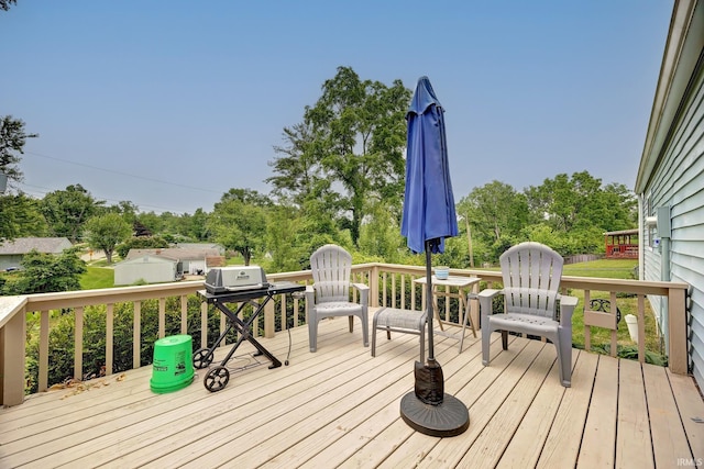 3502 S Tyler Ln, Bloomington, IN 47403 - deck with a grill and view of wooded area