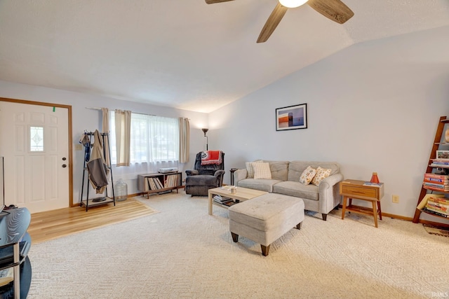 3502 S Tyler Ln, Bloomington, IN 47403 - living room with lofted ceiling, ceiling fan, baseboards, and light carpet