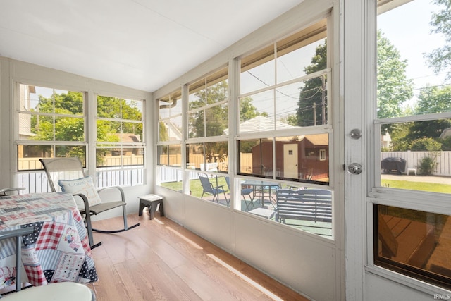 913 Cedar St, Elkhart, IN 46514 - sunroom with healthy amount of natural light and vaulted ceiling