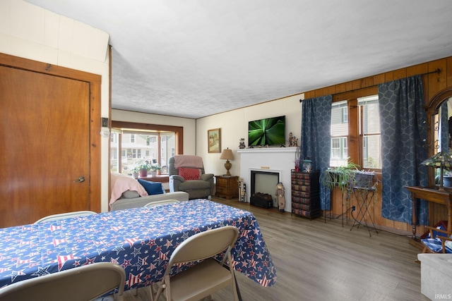 913 Cedar St, Elkhart, IN 46514 - bedroom with wood finished floors and a fireplace