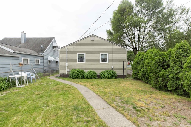 2524 Milburn Blvd, Mishawaka, IN 46544 - rear view of property featuring a lawn