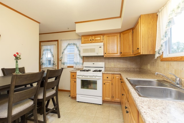 2524 Milburn Blvd, Mishawaka, IN 46544 - kitchen with white appliances, a sink, decorative backsplash, light countertops, and ornamental molding