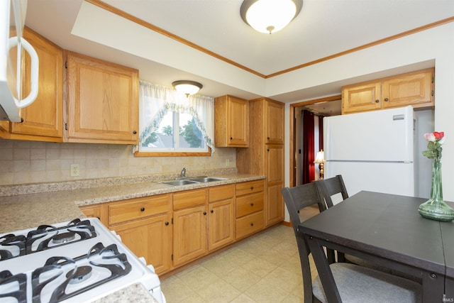 2524 Milburn Blvd, Mishawaka, IN 46544 - kitchen featuring white appliances, light countertops, light floors, a sink, and decorative backsplash