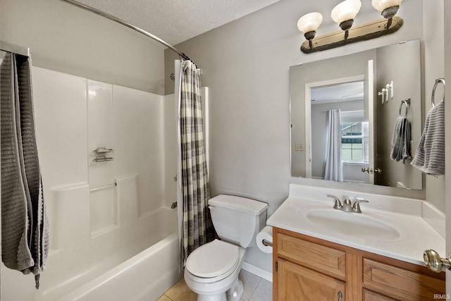 1888 Halyard Ct, West Lafayette, IN 47906 - bathroom featuring vanity, toilet, shower / bath combo, tile patterned flooring, and a textured ceiling