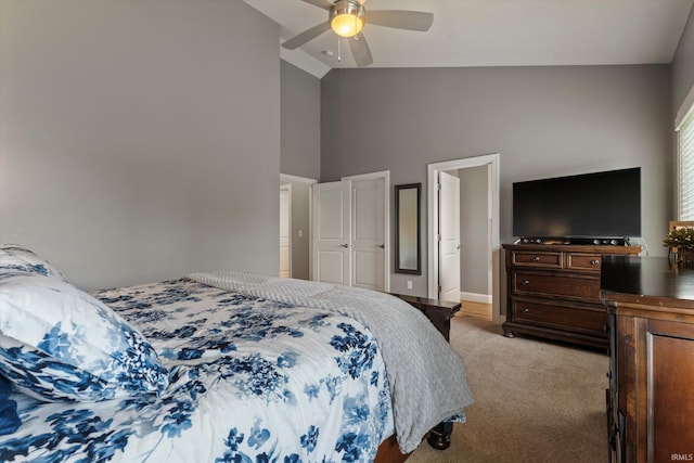 7503 Toscana Ct, Granger, IN 46530 - bedroom featuring light carpet, high vaulted ceiling, ceiling fan, and baseboards