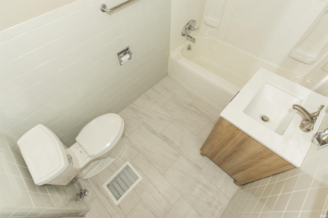 1002 S 33rd St, South Bend, IN 46615 - bathroom with toilet, vanity, and shower / washtub combination