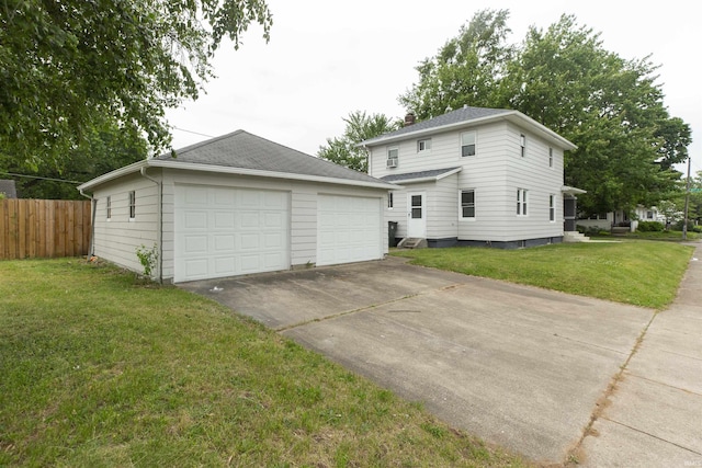 1002 S 33rd St, South Bend, IN 46615 - view of front of home featuring an outdoor structure, a garage, roof with shingles, and a chimney