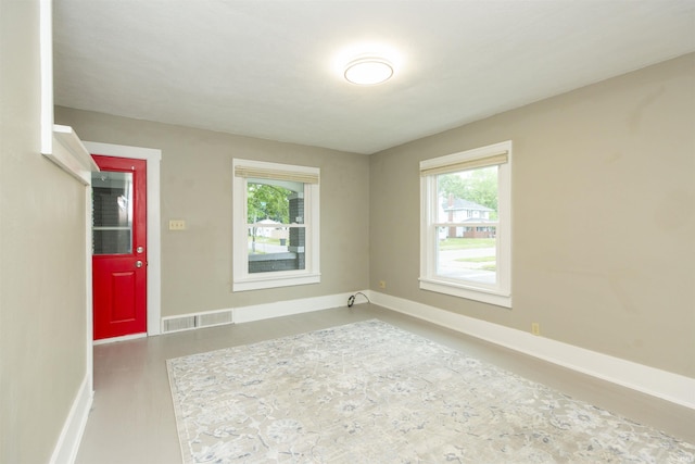 1002 S 33rd St, South Bend, IN 46615 - empty room with baseboards, healthy amount of natural light, and wood finished floors