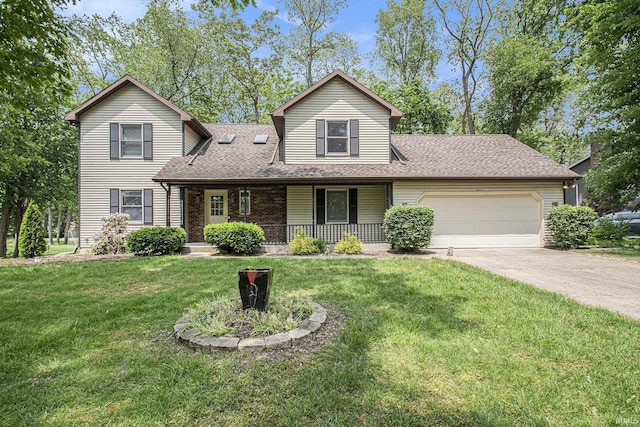 15711 Durham Way, Granger, IN 46530 - view of front of home with a garage, a porch, concrete driveway, a front yard, and a shingled roof