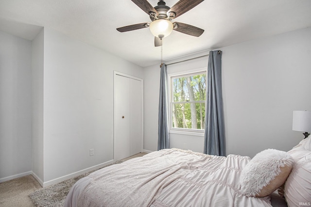 15711 Durham Way, Granger, IN 46530 - carpeted bedroom with baseboards, a closet, and ceiling fan