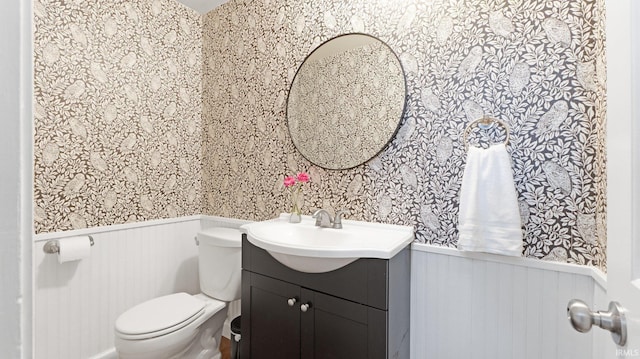 1229 Dell Cove Dr, Fort Wayne, IN 46804 - bathroom featuring wainscoting, wallpapered walls, vanity, and toilet