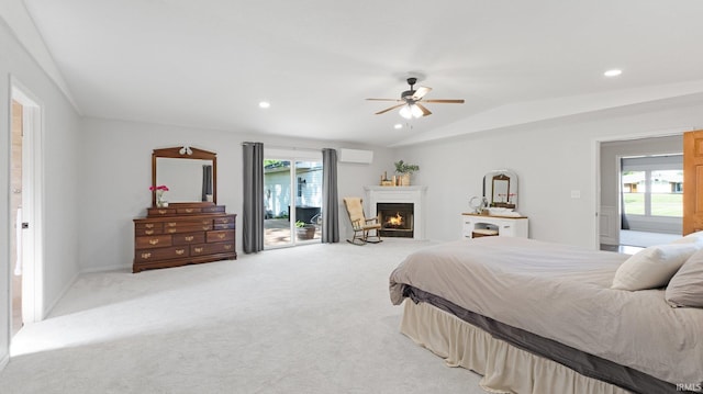 1229 Dell Cove Dr, Fort Wayne, IN 46804 - bedroom featuring vaulted ceiling, light carpet, a lit fireplace, access to exterior, and recessed lighting