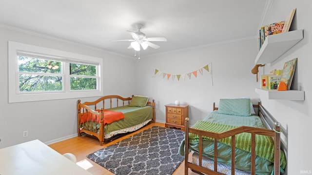 1229 Dell Cove Dr, Fort Wayne, IN 46804 - bedroom featuring crown molding, wood finished floors, baseboards, and a ceiling fan