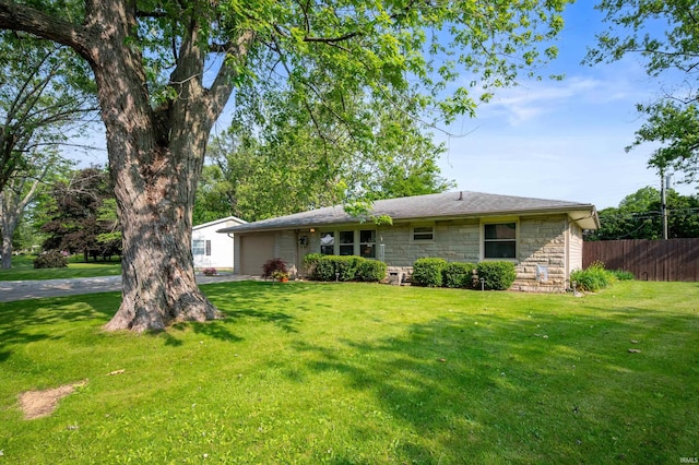2408 W Sheffield Dr, Muncie, IN 47304 - back of property featuring stone siding and a garage