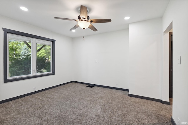 6226 Wheeling Ave, Muncie, IN 47304 - unfurnished room with carpet flooring, a ceiling fan, recessed lighting, and baseboards