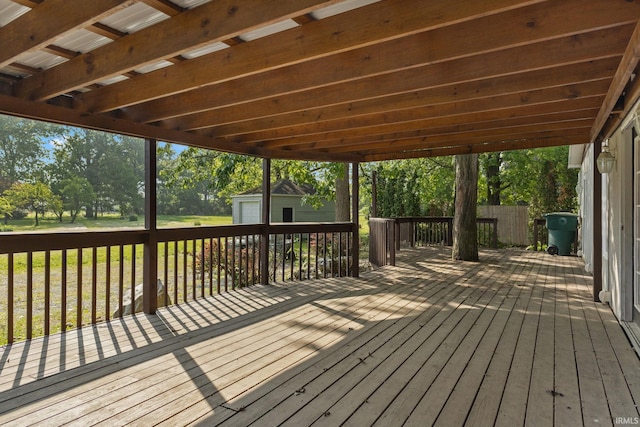 6226 Wheeling Ave, Muncie, IN 47304 - wooden terrace featuring an outbuilding and view of scattered trees
