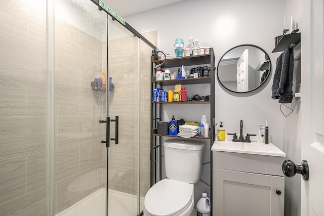 5206 Windfall Ct, South Bend, IN 46619 - bathroom featuring toilet, a shower stall, and vanity