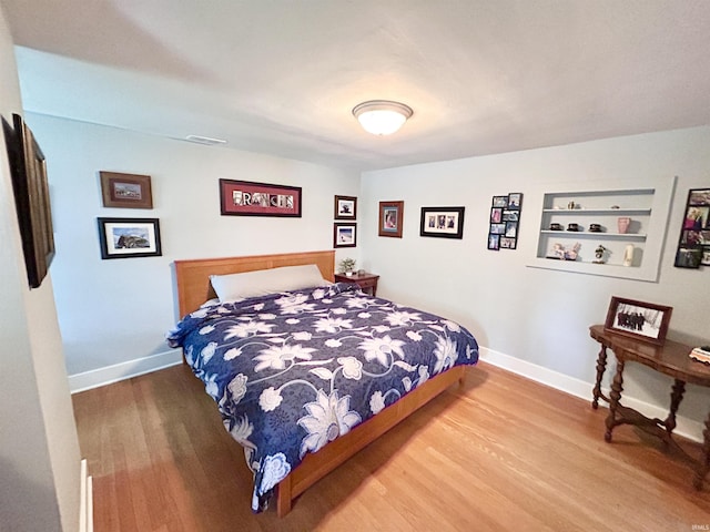 1500 N Grant St, West Lafayette, IN 47906 - bedroom featuring wood finished floors and baseboards