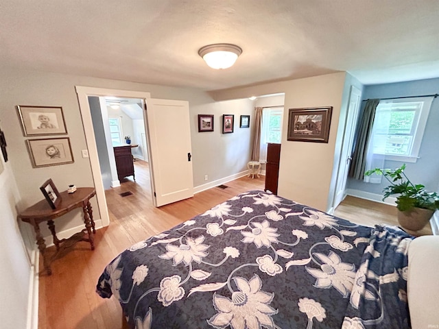 1500 N Grant St, West Lafayette, IN 47906 - bedroom featuring light wood-style flooring and baseboards