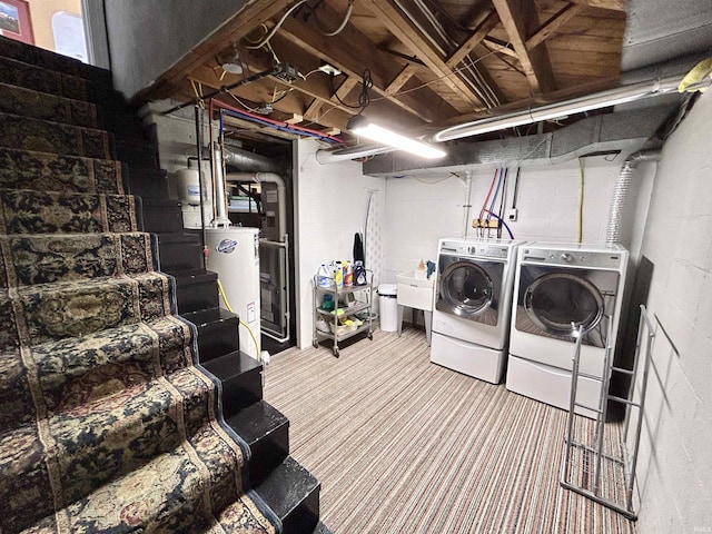1500 N Grant St, West Lafayette, IN 47906 - washroom with gas water heater, washer and dryer, carpet floors, and concrete block wall