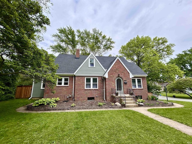 1500 N Grant St, West Lafayette, IN 47906 - view of front facade with a chimney, brick siding, and a shingled roof