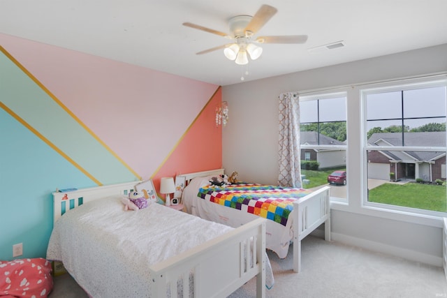 810 Tawny Dr, Evansville, IN 47712 - carpeted bedroom with ceiling fan and baseboards