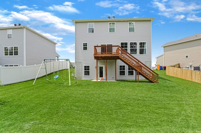 810 Tawny Dr, Evansville, IN 47712 - rear view of house with a playground, stairway, a deck, and central AC