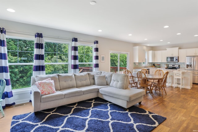 810 Tawny Dr, Evansville, IN 47712 - living area with light wood-style floors and recessed lighting