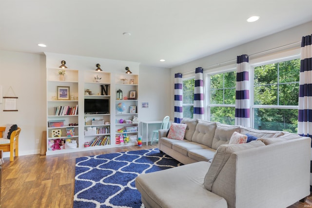 810 Tawny Dr, Evansville, IN 47712 - living area featuring wood finished floors, recessed lighting, and baseboards