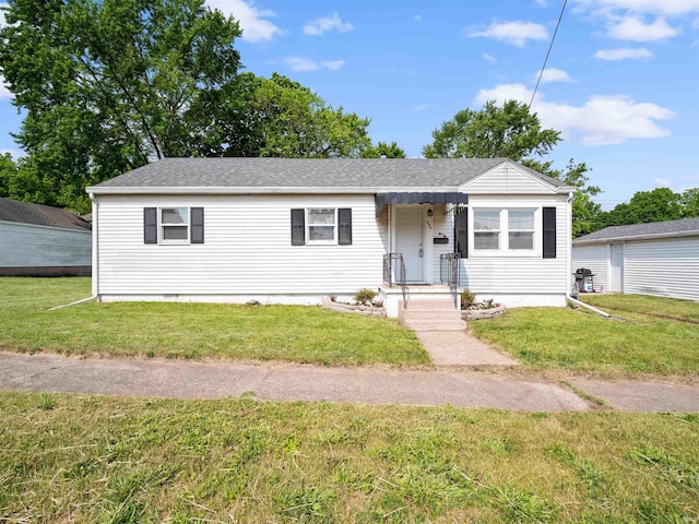 254 Forrest Ave, Wabash, IN 46992 - view of front facade featuring a front yard and roof with shingles
