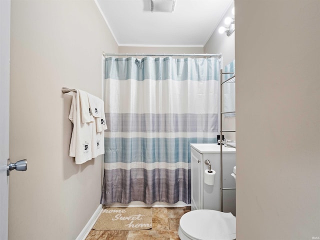 254 Forrest Ave, Wabash, IN 46992 - bathroom with crown molding, toilet, vanity, curtained shower, and baseboards