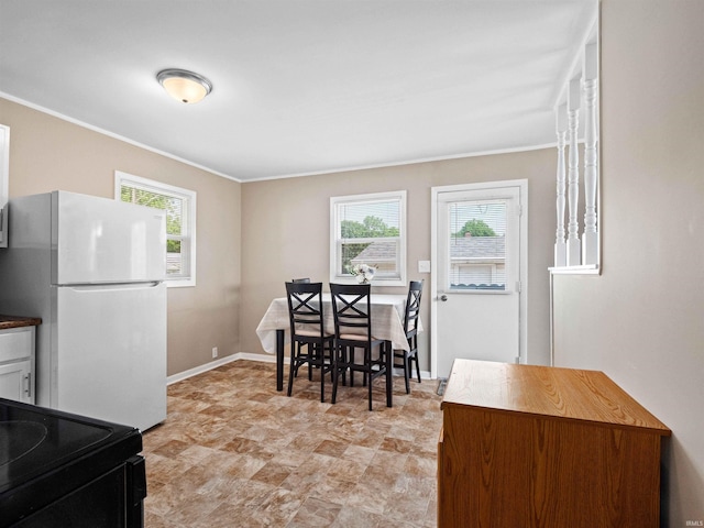254 Forrest Ave, Wabash, IN 46992 - dining area featuring ornamental molding, baseboards, and stone finish flooring