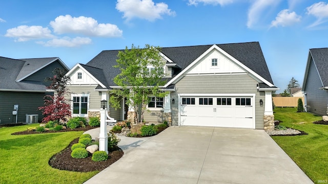 13769 Montoro Ct, Fort Wayne, IN 46845 - craftsman inspired home with board and batten siding, central air condition unit, driveway, and a front yard