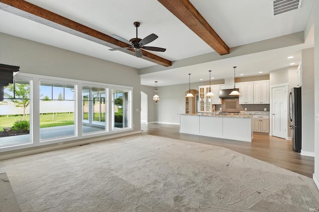 13769 Montoro Ct, Fort Wayne, IN 46845 - unfurnished living room with recessed lighting, ceiling fan, beamed ceiling, baseboards, and light wood-style floors