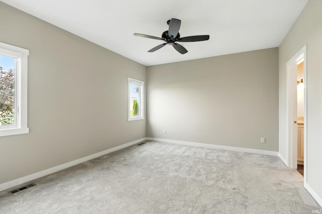 13769 Montoro Ct, Fort Wayne, IN 46845 - unfurnished room featuring light carpet, baseboards, and ceiling fan