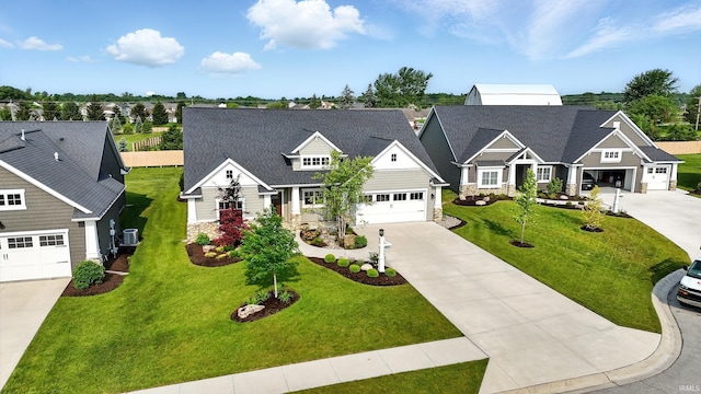 13769 Montoro Ct, Fort Wayne, IN 46845 - craftsman inspired home with stone siding, concrete driveway, and a front yard