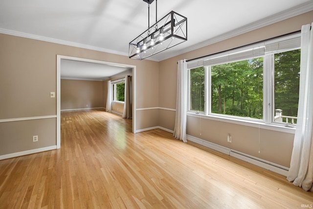 201 Colony Rd, West Lafayette, IN 47906 - unfurnished dining area with ornamental molding, light wood-style floors, baseboards, and a chandelier